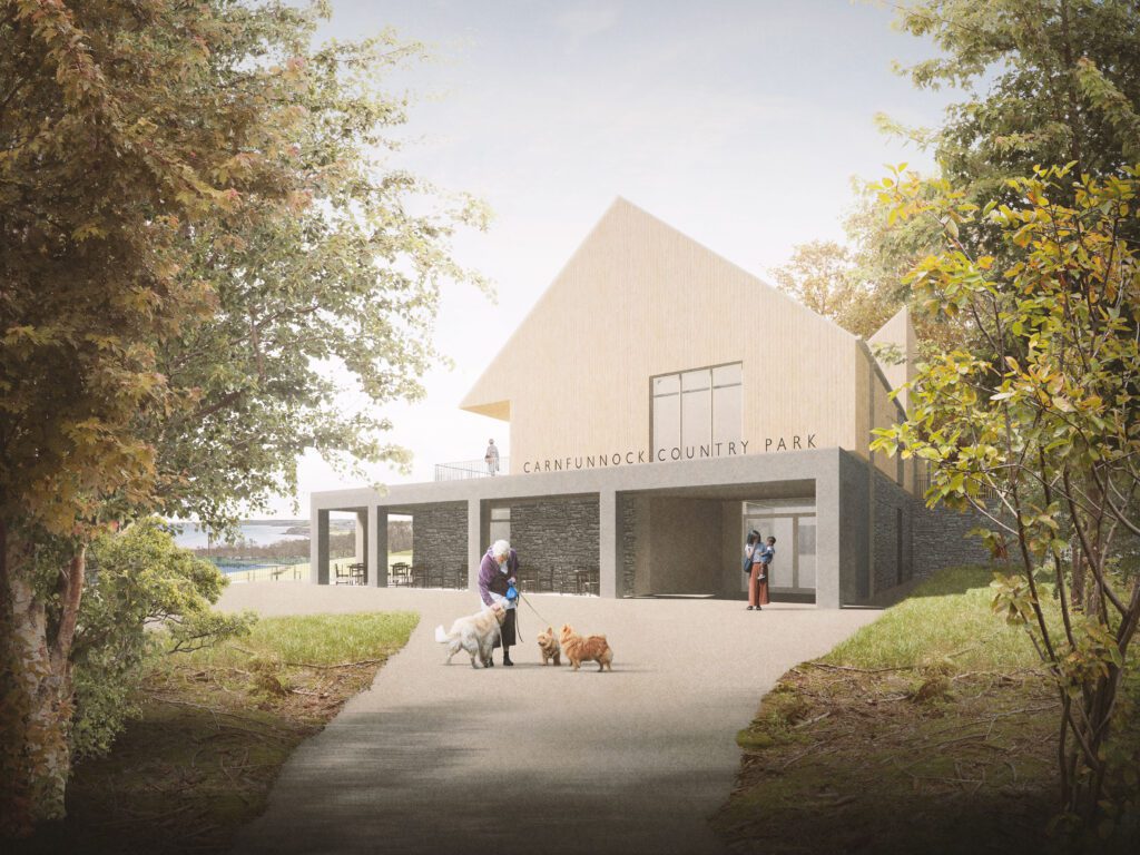 A modern building labeled “Carnfunnock Visitor Centre” stands among trees; people with dogs and another person are visible near the entrance.